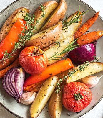 healthy vegetables including potatoes tomatoes onions carrots