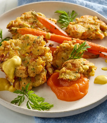 Roasted Carrots & Carrot-Top Frittelles With Ginger-Lime Carrot Purée & Curried Crema