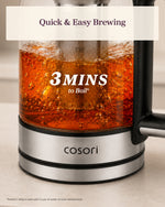 COSORI electric kettle boiling water in 3 minutes with tea brewing in the infuser
