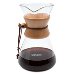 COSORI Original 8-Cup Pour-Over Coffee Maker with glass carafe and wooden collar filled with brewed coffee