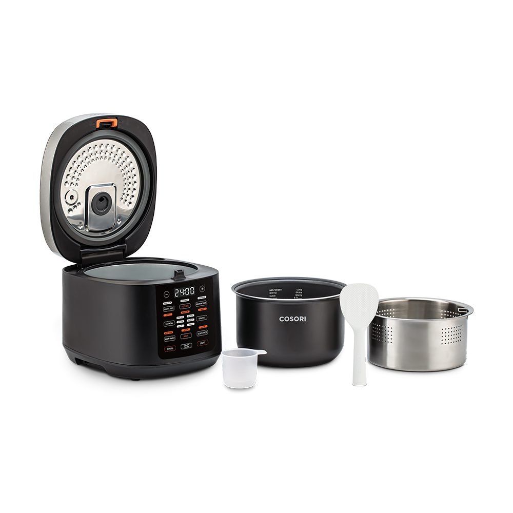 Cosori Rice Cooker displayed with all included accessories: inner pot, steam basket, paddle, and cup.