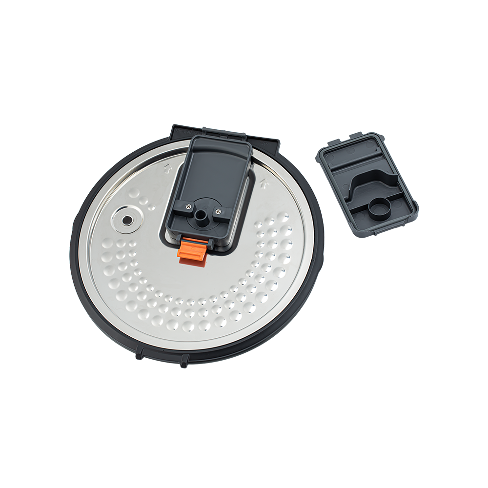 Disassembled steam vent cap components from the Cosori Rice Cooker inner lid for easy cleaning.